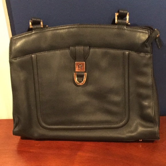 Etienne Aigner Handbags - Etienne Aigner dark navy purse with gold accents